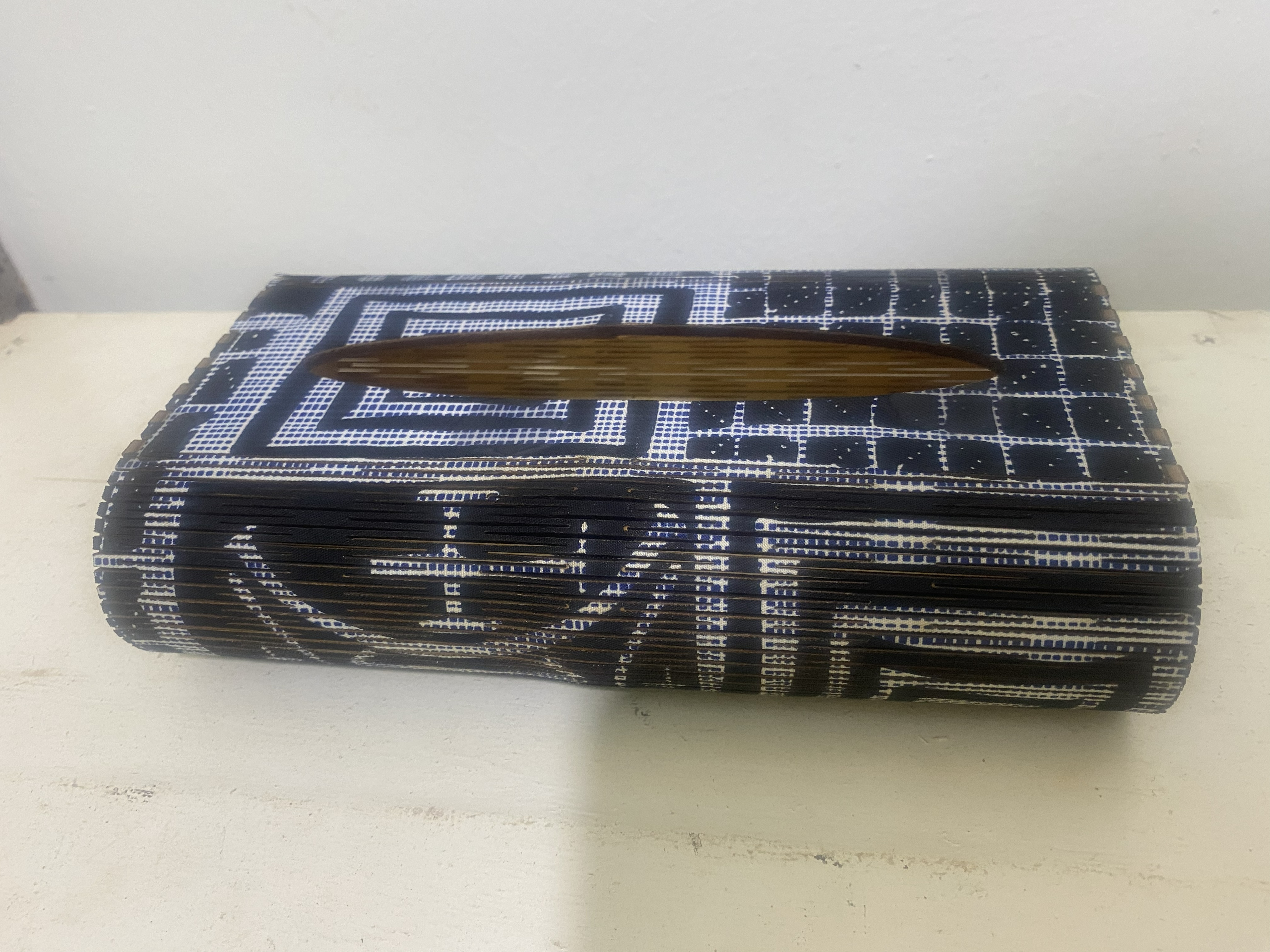 Laser cut tissue box